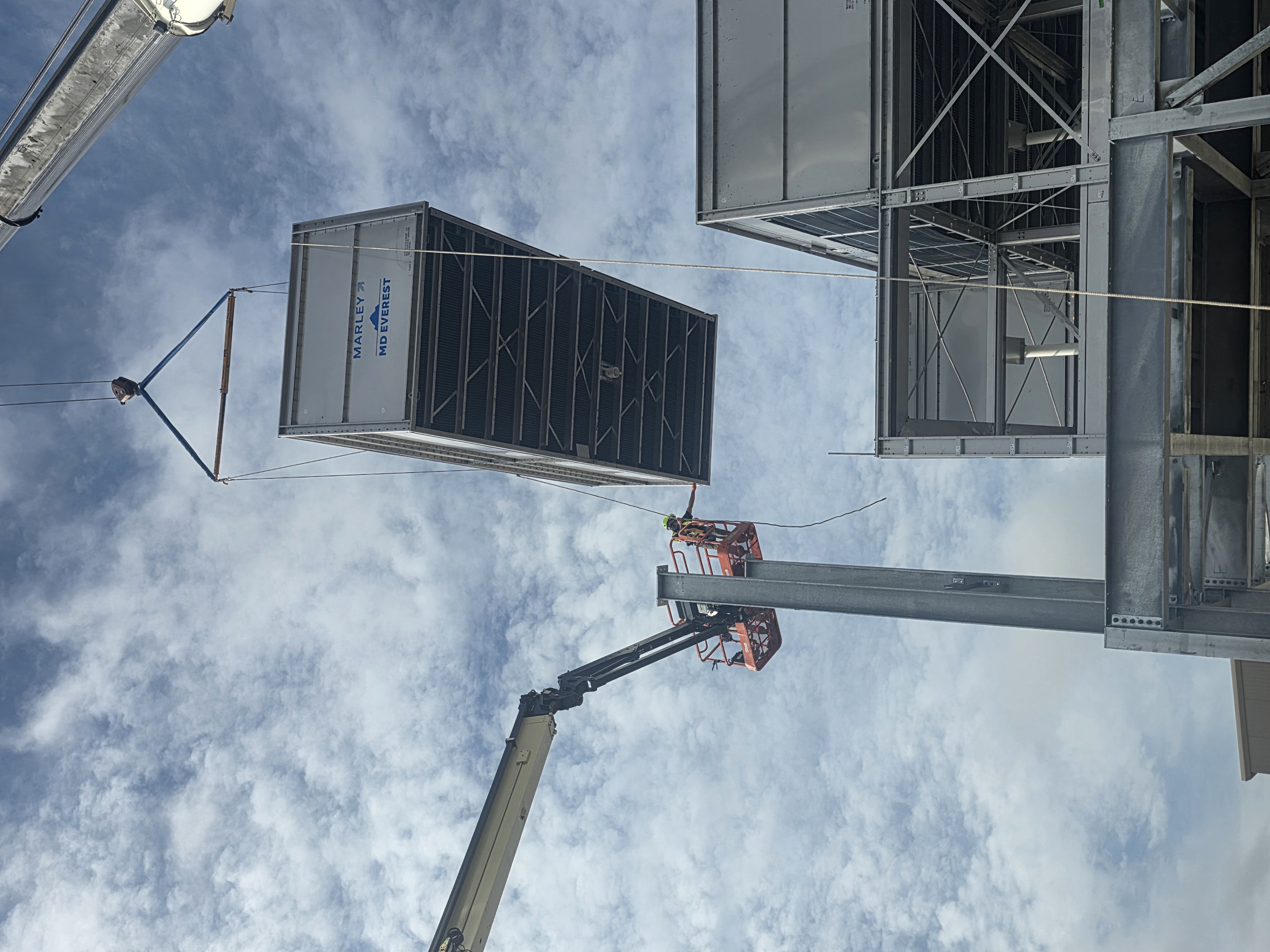 Cooling tower section being lifted into position during installation