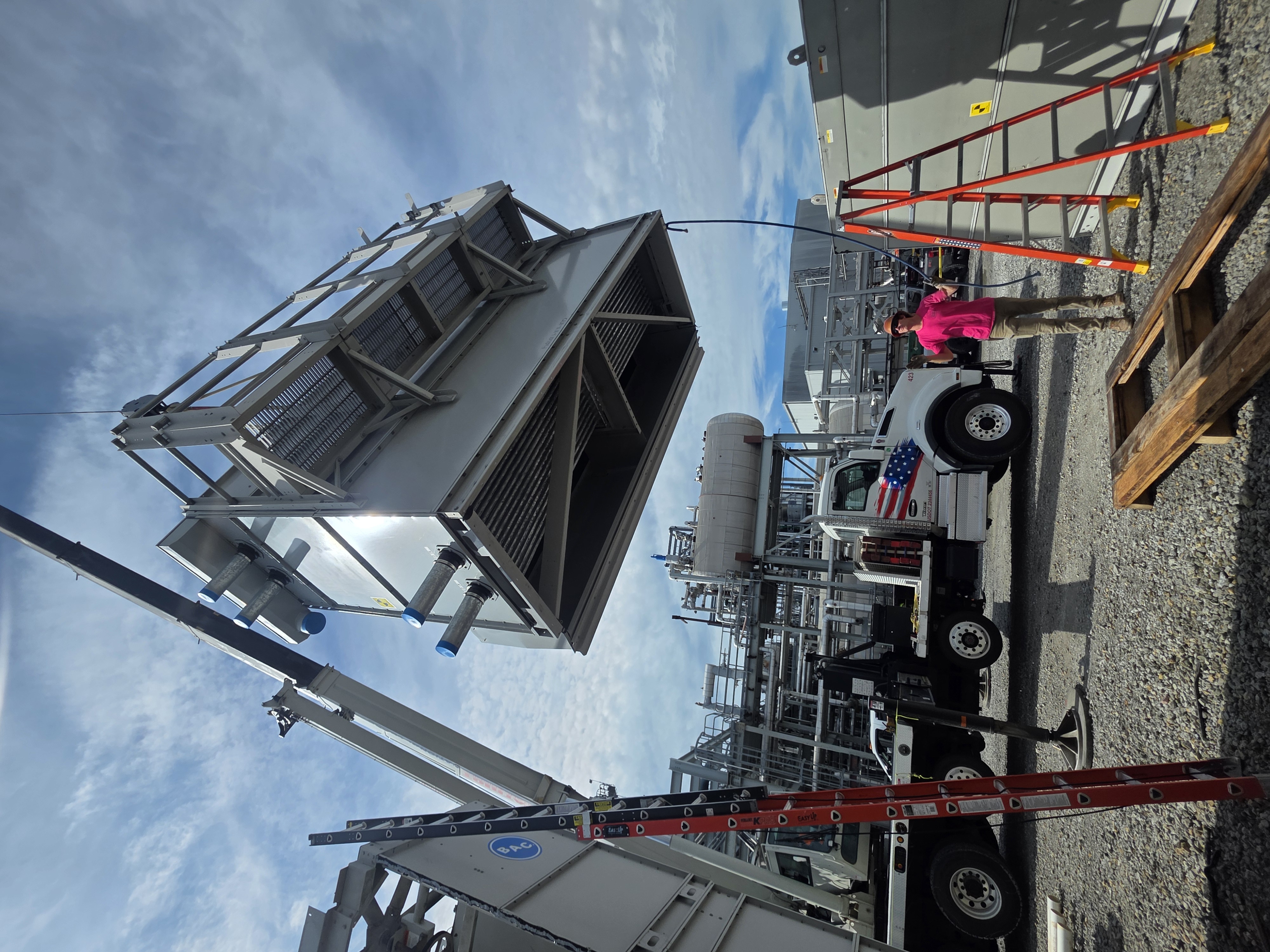 Large cooling tower section being positioned during installation